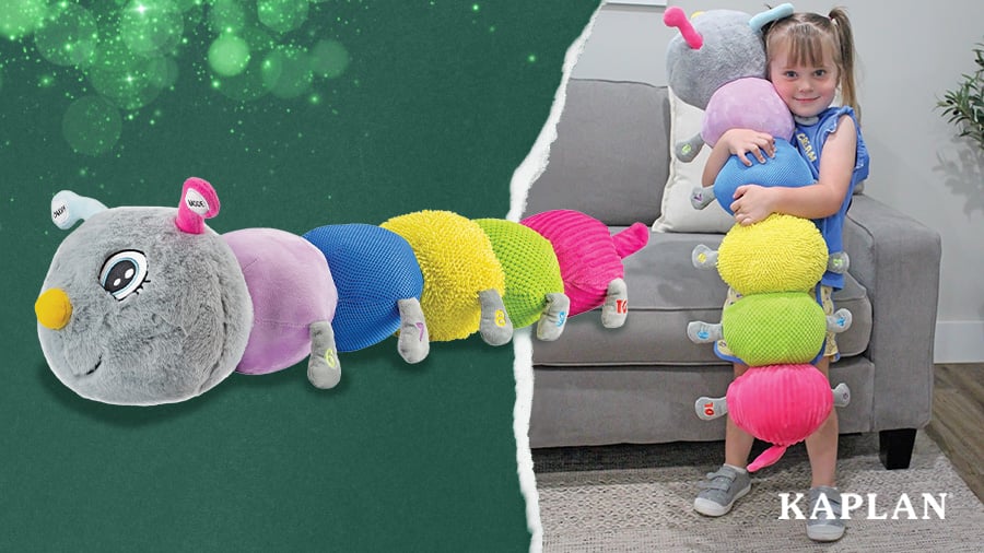 A child hugs a Cuddlebug Vibrating Sensory Caterpillar