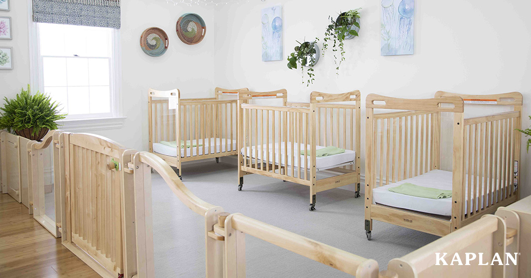 Light-filled classroom with cribs for naptime.