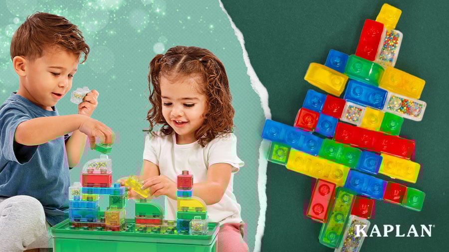 Two children stack and build with a Jelly Blox Stash N Stack Set.