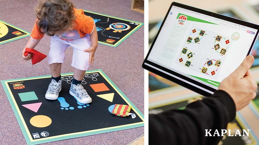 A child stands on an Action Mat while holding a red beanbag in their hand.