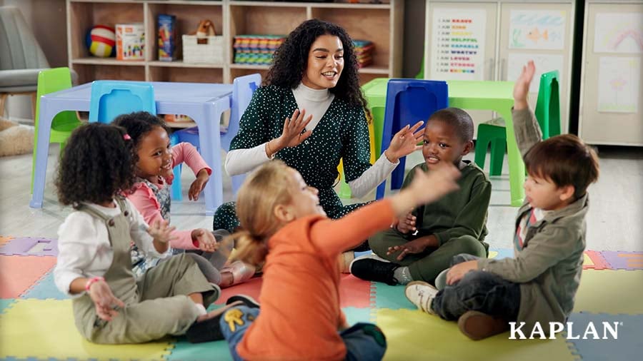 Early childhood educator engaging with children during circle time activity