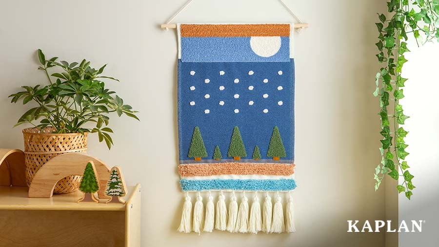 Nature-inspired classroom corner with neutral-colored decor, wooden toys, and plants