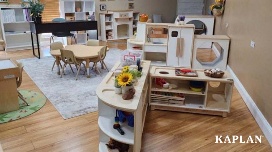 An image of the toddler classroom at East Gate Kids showing the Sense of Place for Wee Ones furniture in a uniquely shaped classroom. 