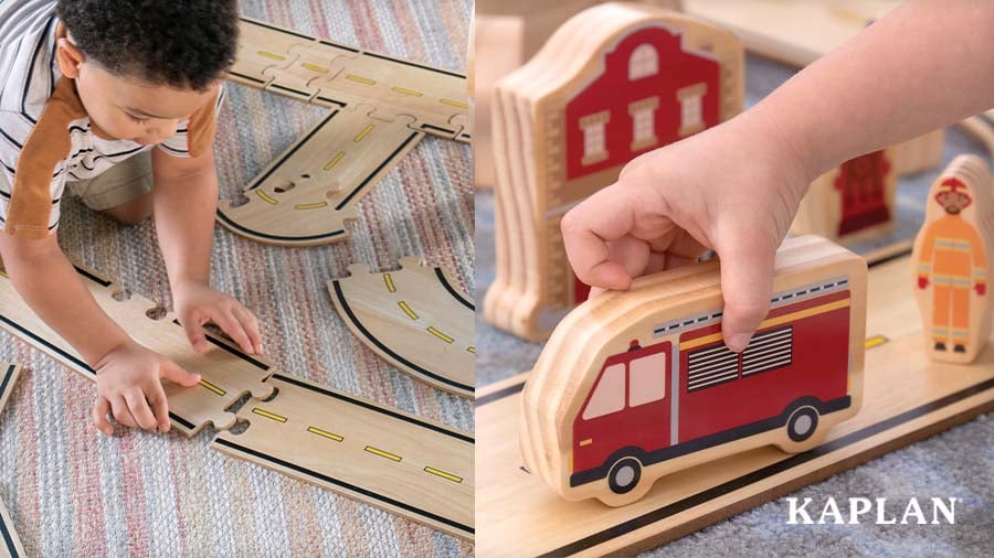 A toddler connects wooden road pieces from the Community Block Builders Bundle, beside a close-up of a child driving the wooden fire truck
