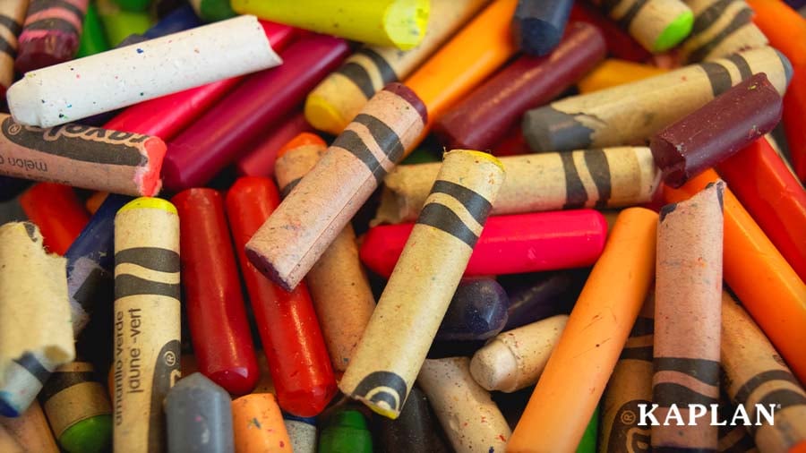 Pile of broken and worn crayons in an early childhood classroom