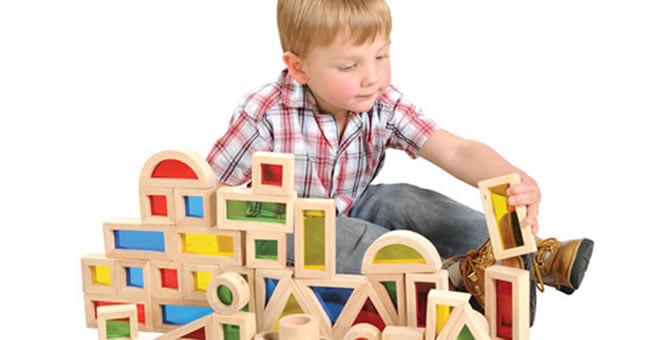 kid playing with blocks