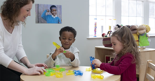 children playing in classroom