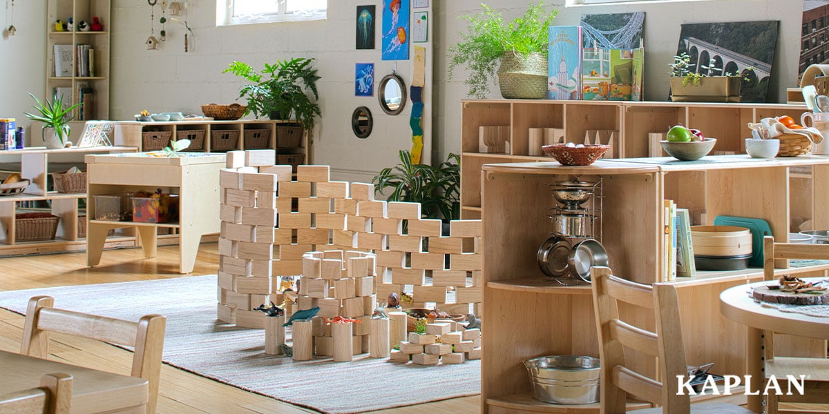 Featured image: An image of an early childhood classroom, focusing on the block learning center where a large tower of wooden blocks stands on a classroom rug.  - Read full post: Guide to Using the South Carolina Child Care Expansion/Operating Grant Effectively