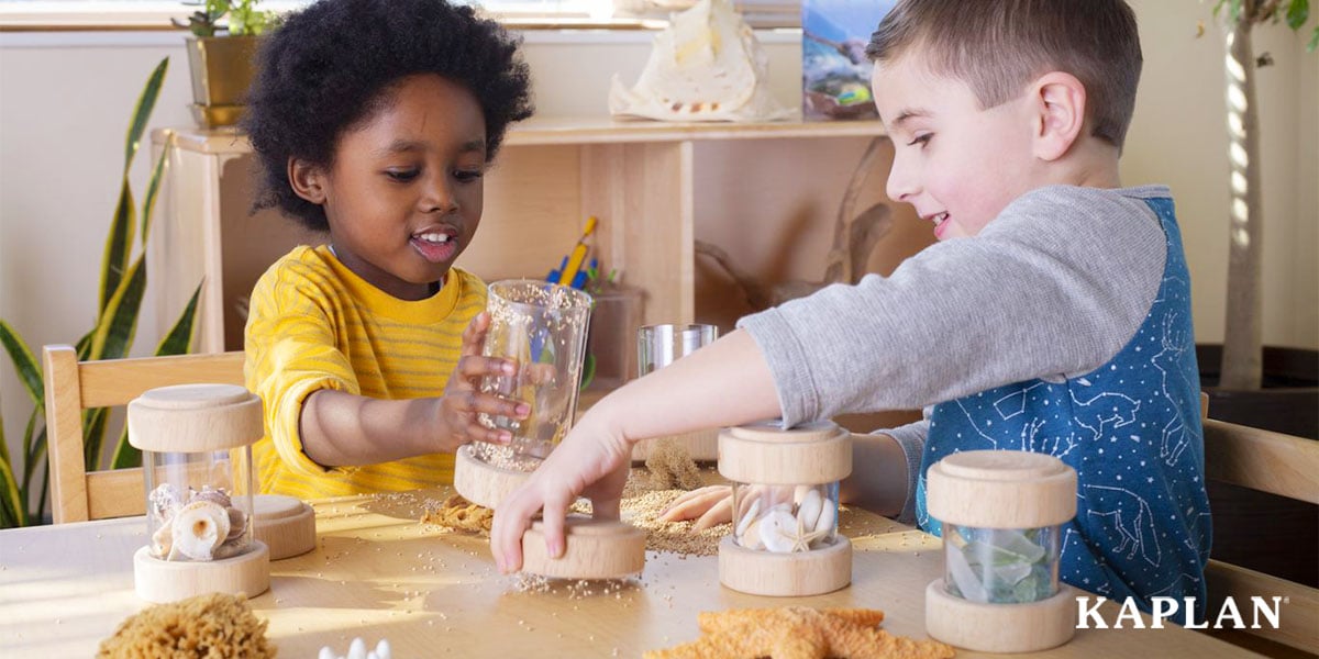 Featured image: Two young children explore a sensory bin at a classroom table - Read full post: Simple Classroom Updates That Can Transform Learning Spaces