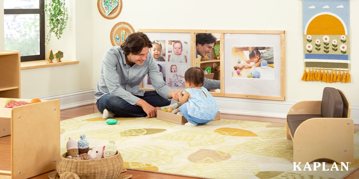 Featured image: An early childhood teacher sits on the floor of an infant classroom, a young child is sitting on the floor in front of the teacher reaching for blocks.  - Read full post: Texas Rising Star Requirements: A Guide for Child Care Services Providers