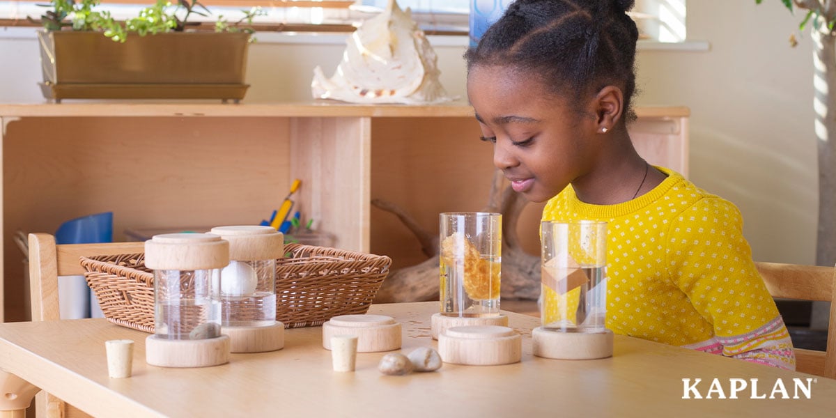 Featured image: A young child in a yellow shirt sits at a wooden table in an early childhood classroom. The child is looking down at a see-through container which is holding water and a sponge.  - Read full post: The Benefits of Project-Based Learning in Early Education